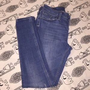535 Distressed Super Skinny Jeans